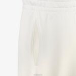 מכנסי טרנינג של lacoste x goop כותנה DZ4D0D2665 לבן 70V נשים - Image 3