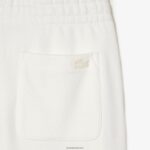 מכנסי טרנינג של lacoste x goop כותנה DZ4D0D2665 לבן 70V נשים - Image 4
