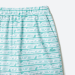 Lacoste בגד ים בהדפס דו גוונים DZ4D0D525 ירוק בהיר cr5 גברים - Image 5