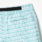 Lacoste בגד ים בהדפס דו גוונים DZ4D0D525 ירוק בהיר cr5 גברים - Image 8