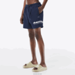 Lacoste בגד ים עם פס לוגו ייבוש מהיר DZ4D0D528 כחול kxe גברים - Image 2