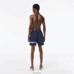 Lacoste בגד ים עם פס לוגו ייבוש מהיר DZ4D0D528 כחול kxe גברים - Image 3