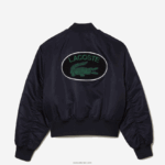 Lacoste ז'קט בומבר ניילון קווילט DZ4D0D2623 כחול כהה hde נשים - Image 7