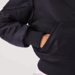 Lacoste ז'קט בומבר ניילון קווילט DZ4D0D2623 כחול כהה hde נשים - Image 9