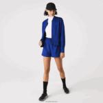 Lacoste ז'קט דו-שכבתי נמתח DZ4D0D2625 כחול bdm נשים - Image 5