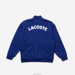 Lacoste ז'קט פליסה עם רוכסן צווארון סטנד-אפ ממותג המורשת DZ4D0D3249 כחול לבן emj ילדים - Image 2