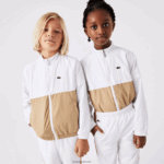 Lacoste ז'קט קולורבלוק בעל צוואר גבוה DZ4D0D3220 לבן בז' wn5 ילדים