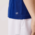 Lacoste חולצת טי פיקה קלה נושמת תלת-קולור DZ4D0D908 לבן ירוק נייבי כחול לבן cmn גברים - Image 7