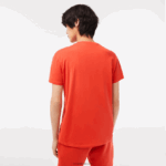 Lacoste חולצת טי של פימה כותנה עם צווארון V DZ4D0D39 כתום 02k גברים - Image 3