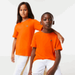 Lacoste חולצת טריקו מבד כותנה עם צווארון צווארון DZ4D0D3177 כתום z4d ילדים