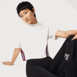 Lacoste חולצת טריקו מודפסת בגזרה רופפת DZ4D0D2547 לבן 70V נשים