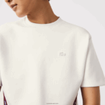Lacoste חולצת טריקו מודפסת בגזרה רופפת DZ4D0D2547 לבן 70V נשים - Image 4