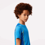Lacoste חולצת טריקו של טניס קולורבלוק פיקה DZ4D0D3009 CDD כחול צהוב בנים - Image 2