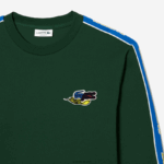 Lacoste חולצת טריקו של להקה ממותגת DZ4D0D720 ירוק 132 גברים - Image 2