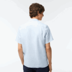 Lacoste חולצת פשתן עם שרוולים קצרים DZ4D0D488 כחול בהיר t01 גברים - Image 3