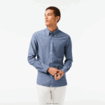 Lacoste חולצת צ'מברי מכותנה בגזרה דקיקה DZ4D0D1573 כחול cdz גברים