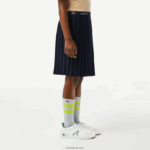 Lacoste חצאית ג'רסי קפלים DZ4D0D3091 כחול כהה 166 בנות - Image 2