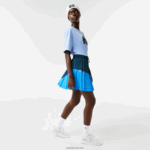 Lacoste חצאית קפלים ניילון בצבע בלוק DZ4D0D2595 כחול לוה נשים - Image 2