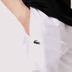 Lacoste מכנסי אימונית מבד קל משקל DZ4D0D549 לבן 001 גברים - Image 4