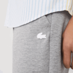 Lacoste מכנסי אימונית של אימונית בגזרת כותנה מחוסמת בגזרה דקיקה DZ4D0D1005 אפור chine 4jv גברים - Image 2