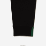 Lacoste מכנסי אימונית של אימונית בגזרת כותנה מחוסמת בגזרה דקיקה DZ4D0D1004 שחור 031 גברים - Image 6
