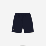 Lacoste מכנסי ברמודה מכותנה קלים משקל DZ4D0D3106 כחול כהה 166 בנים