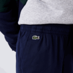 Lacoste מכנסי גבארדין מכותנה מתיחה DZ4D0D3269 כחול כהה 166 בנים - Image 4