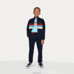 Lacoste מכנסי ג'וגינג בצבע רצועת מותן DZ4D0D3266 כחול כהה 166 ילדים