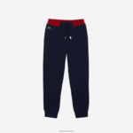Lacoste מכנסי ג'וגינג בצבע רצועת מותן DZ4D0D3266 כחול כהה 166 ילדים - Image 3