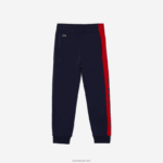 Lacoste מכנסי ג'וגינג בתערובת צמר כותנה DZ4D0D3243 כחול כהה אדום k1h בנים