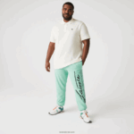 Lacoste מכנסי ג'וגינג מכותנה בהדפס חתימה ותנין DZ4D0D1066 ירוק hcv גברים - Image 6