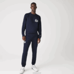 Lacoste מכנסי ג'וגינג מכותנה במיתוג תנין DZ4D0D1095 כחול כהה 166 גברים