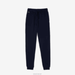 Lacoste מכנסי ג'וגינג פליסה קלים DZ4D0D2593 כחול כהה 166 נשים - Image 4