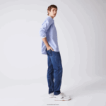 Lacoste מכנסי ג'ינס מכותנה נמתחת בגזרה דקיקה DZ4D0D419 כחול mk9 גברים