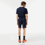 Lacoste מכנסי טניס קצרים מפוליאסטר ממוחזר DZ4D0D426 כחול כהה אדום כתום xii גברים - Image 3
