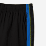 Lacoste מכנסי טניס קצרים מפוליאסטר ממוחזר DZ4D0D425 שחור כחול צהוב xis גברים - Image 5