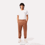 Lacoste מכנסי טרנינג בהדפס מונוגרמה DZ4D0D317 lfa חום בהיר גברים