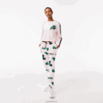 Lacoste מכנסי טרנינג בהדפס קומיקס DZ4D0D2569 ורוד בהיר t03 נשים