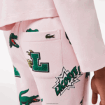 Lacoste מכנסי טרנינג בהדפס קומיקס DZ4D0D2569 ורוד בהיר t03 נשים - Image 4