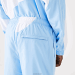 Lacoste מכנסי טרנינג גרפי מורשת DZ4D0D1071 כחול לבן e7b גברים - Image 6