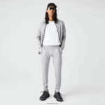 Lacoste מכנסי טרנינג דו-שכבתיים DZ4D0D1073 chine אפור בהיר 9ya גברים