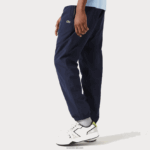 Lacoste מכנסי טרנינג דוחי מים בכושר רגיל DZ4D0D332 כחול כהה 166 גברים - Image 3