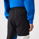 Lacoste מכנסי טרנינג דוחי מים טלאים DZ4D0D1105 שחור כחול לבן se1 גברים - Image 7