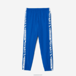 Lacoste מכנסי טרנינג טניס עם הדפסי צד DZ4D0D1087 כחול k1q גברים - Image 6