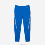 Lacoste מכנסי טרנינג להקות מודפסות DZ4D0D1460 כחול k1q גברים