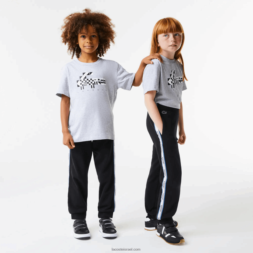 lacoste_d79ed79bd7a0d7a1d799_d798d7a8d7a0d799d7a0d792_d79cd794d7a7d795d7aa_d79ed795d793d7a4d7a1d795d7aa_dz4d0d3223_d7a9d797d795.png Lacoste מכנסי טרנינג להקות מודפסות DZ4D0D3223 שחור כחול 985 ילדים - Image 1
