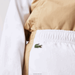 Lacoste מכנסי טרנינג להקת קונטרסט DZ4D0D3224 לבן בז' wn5 ילדים - Image 4