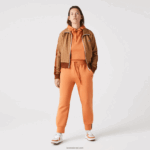Lacoste מכנסי טרנינג מכותנה DZ4D0D2405 כתום wwc נשים - Image 7