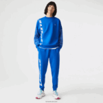 Lacoste מכנסי טרנינג ממותגים בגזרה דקיקה DZ4D0D975 כחול k1q גברים - Image 2