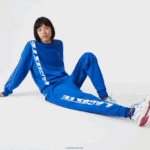 Lacoste מכנסי טרנינג ממותגים בגזרה דקיקה DZ4D0D975 כחול k1q גברים